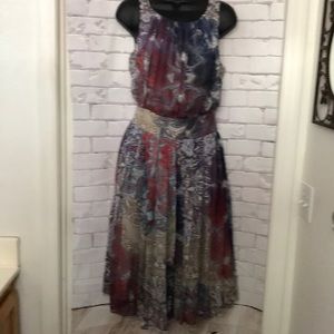 Women’s BGN beautiful silk sleeveless sheer dress.